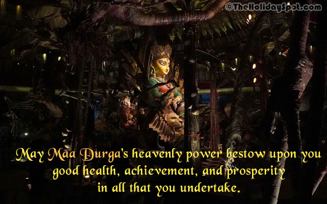 A Durga Puja card with a message for good health, achievement and prosperity