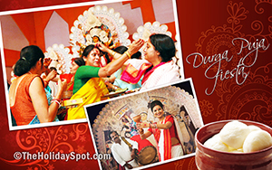 Durga Puja wallpaper showing the famous sindur khela or the vermilion applying game which married women play at the last hour of Durga puja celebration.