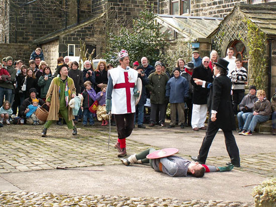 St George slaying Bold Slasher at the Heptonstall Pace Egg Play