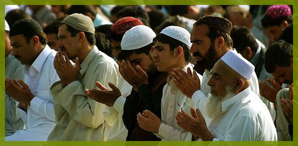 Muslims praying on the eve of Eid-ul-Adha at Pakistan