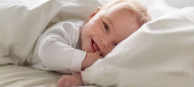 Wonderful good morning image for Twitter and Pinterest with a background of a smiling baby