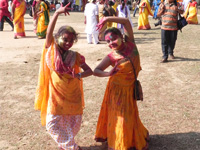 two girls in dancing pose at Shantiniketan