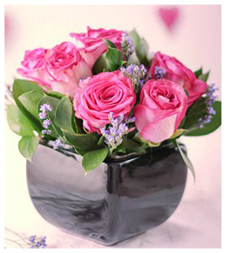Pink Roses in flower vase for mothers day decoration