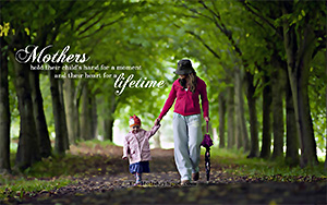A wonderful wallpaper on mother's day showing mother walking with child holding her hand