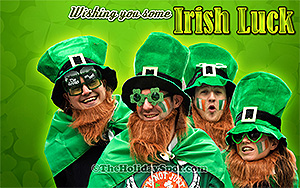 A group dressed in St. Patrick's Day costume wishing Irish luck wallpaper
