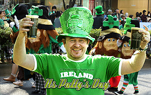 Wallpaper showing a man cheering for the St. Patricks Day occasion.