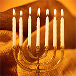 Menorah with candle lit