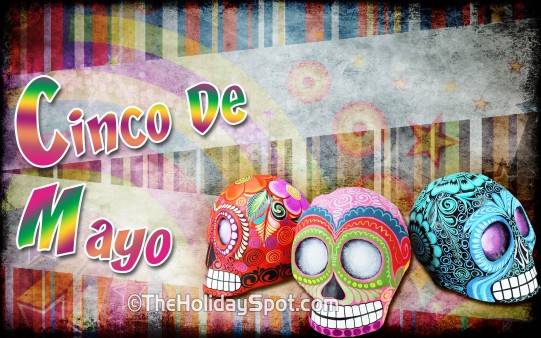 Colorful high defination wallpaper showing colored Mexican skulls.