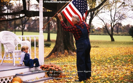 High Quality July 4th wallpaper featuring grandpa and grandson hosting U.S Flag.
