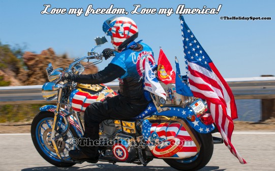 man riding on a bike and proclaiming his love for his country America wallpaper